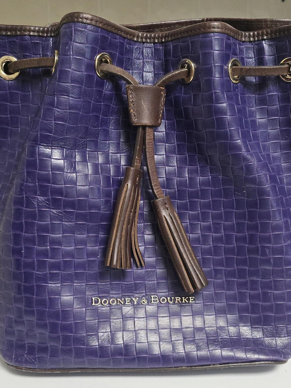 Dooney & Bourke Claremont Purple Woven Embossed Leather Drawstring Bucket Bag